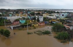 Kawasan Nellore, negara bagian Andhra Pradesh, India selatan, yang tergenang banjir, Sabtu, 20 November 2021.