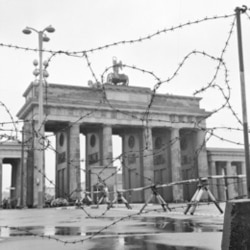 Barbed wire bars passage through the Brandenburg Gate at the East-West border in Berlin in 1961