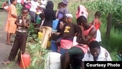 The water crisis is forcing most residents to fetch water from Mucheke River.