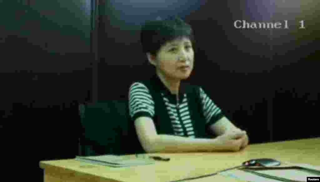 谷开来，2013年8月10日济南中级人民法院视频截屏。2013年8月23日济南中级人民法院在薄熙来审判庭上展示该截屏。