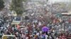 Indians throng a market for shopping ahead of Hindu festival Diwali in Ahmedabad, India, Thursday, Nov. 12, 2020.