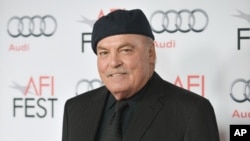 FILE - Stacey Keach arrives at the 2013 AFI Fest premiere of "Nebraska" at the TCL Chinese Theatre in Los Angeles, Nov. 11, 2013.
