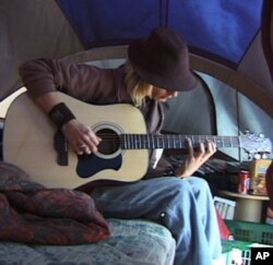 The Renaults and four of their children make do in a travel-trailer with 20 square meters of living space.