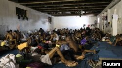 Migrantes em Trípoli
