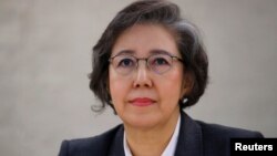 FILE - Special Rapporteur on the situation of human rights in Myanmar, Yanghee Lee gives her report to the Human Rights Council at the United Nations in Geneva, Switzerland, March 12, 2018. 