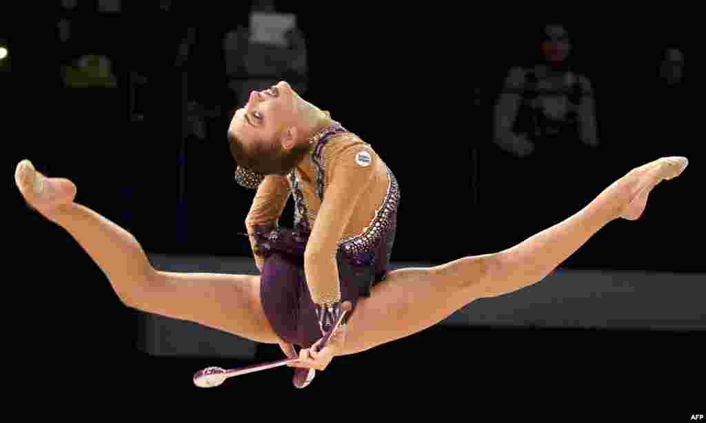 Third placed Melitina Staniouta of Belarus performs with the clubs during the final of the Rhythmic Gymnastics World Cup 2016 competition in Espoo, Finland.