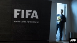 Employee waits prior to a press conference at the FIFA heaquarters on May 27, 2015 in Zurich. 