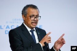 FILE - WHO Director-General Tedros Adhanom Ghebreyesus speaks during the opening of the World Health Organization Academy in Lyon, France, Sept. 27, 2021.