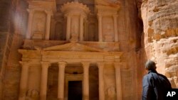 U.S. President Barack Obama stops to look at the Treasury during his tour of the ancient city of Petra, Jordan, March 23, 2013. 