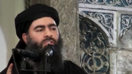 This image taken from a militant website July 5, 2014, purports to show the leader of the Islamic State group, Abu Bakr al-Baghdadi, who released a message encouraging his followers to keep up the fight for the city of Mosul.