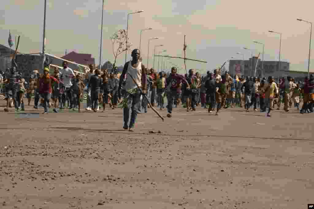 Angry residents take to the streets to protest recent violence in Goma, Democratic Republic of Congo.