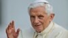 Pope Benedict XVI delivers his blessing as he arrives for a weekly general audience in St.Peter's Square at the Vatican, Oct. 3, 2012. 