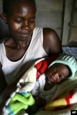 A mother with her newborn baby in a MSF clinic in Zimbabwe. For many illegal immigrants, MSF facilities offer their only chance of health care