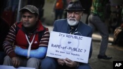 An elderly Indian participates in a protest against gender discrimination and sexual violence in New Delhi, India, Jan. 26, 2013. 