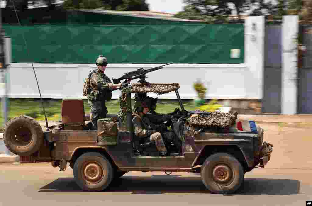 French Special Forces race through Bangui, Central African Republic, Dec. 5, 2013.