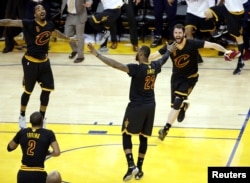 Cleveland Cavaliers celebrate after winning the NBA title.