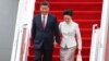Chinese President Xi Jinping and his wife, Peng Liyuan, arrive in Hong Kong, ahead of celebrations marking the 20th anniversary of the city's handover from British to Chinese rule, June 29, 2017.