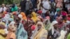 Cabo Delgado, famílias esperando chegada de familiares de Palma, porto de Pemba