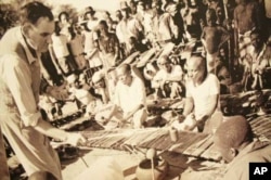 Hugh Tracey recording xylophone music in Mozambique in the early 1950s