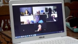 Members of Democrats Abroad Thailand's Covid-19 vaccine task force holds a weekly meeting on Zoom.