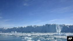 Polar ice sheets in Greenland (pictured above) and Antarctica are losing mass at an accelerated rate and will add significantly to sea level rise.