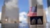 USA, A postcard of the Twin Towers is seen at the 9/11 Memorial ahead of the 20th anniversary of the September 11 attacks in Manhattan, New York City, U.S., September 10, 2021. 