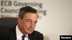 European Central Bank (ECB) president Mario Draghi addresses a news conference after a meeting of the ECB Governing Council in St Julian's, outside Valletta, Malta, Oct. 22, 2015. 