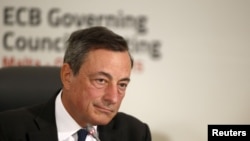 FILE - European Central Bank (ECB) president Mario Draghi addresses a news conference after a meeting of the ECB Governing Council in St Julian's, outside Valletta, Malta, Oct. 22, 2015. 