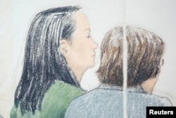 FILE - Huawei CFO Meng Wanzhou (L), who was arrested on an extradition warrant, appears at her B.C. Supreme Court bail hearing in a drawing in Vancouver, British Columbia, Canada, Dec. 10, 2018.