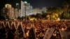 Hong Kong Tiananmen Anniversary: Tens of thousands of people attend a candlelight vigil at Victoria Park in Hong Kong, Saturday, June 4, 2016, to commemorate victims of the 1989 military crackdown in Beijing.