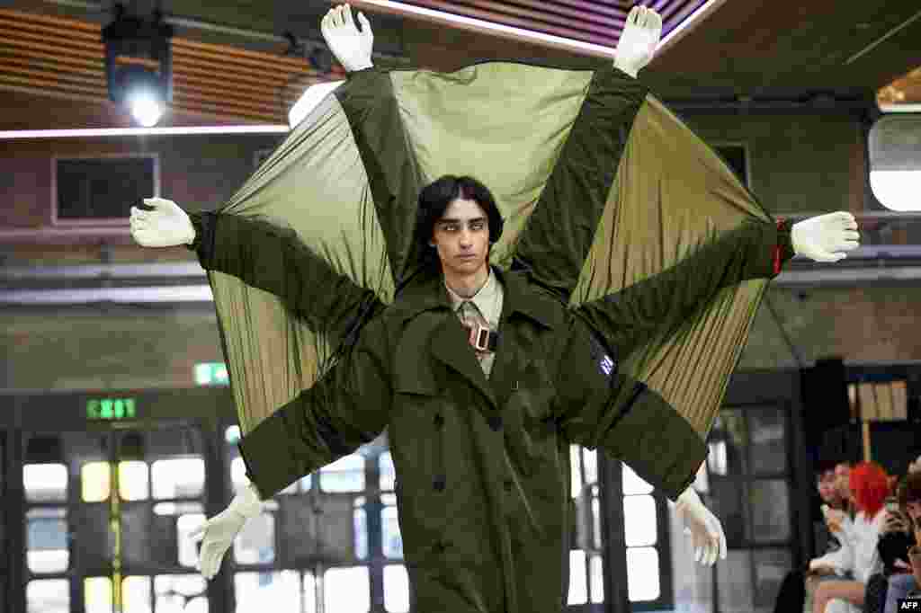 A model presents a creation by Chinese designer Xander Zhou on the third day of the Spring/Summer 2019 London Fashion Week Men&#39;s fashion event in London.