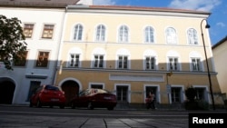 FILE - The house in which Adolf Hitler was born is seen in the northern Austrian city of Braunau am Inn, Sept. 24, 2012.