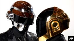 Thomas Bangalter, left, and Guy-Manuel de Homem-Christo, from the group Daft Punk pose for a portrait in Los Angeles, April 17, 2013.