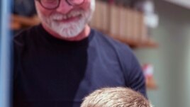 Norway's Minister of Health, Bent Hoie Abid Raja gets his hair cut by hair dresser Morten Johansen, as hair dressers reopened after being closed down for more than six weeks in an effort to avoid spreading fo the COVID-19 Coronavirus, in Oslo, Norway.