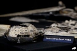 Debris from a UAV (Qasef) is displayed with a sign that reads "On Loan From Saudi Arabia" at the Iranian Materiel Display (IMD) at Joint Base Anacostia-Bolling, in Washington, Nov. 29, 2018. The presentation displays weapons and fragments of weapons seized in Afghanistan, Bahrain and Yemen that it said are evidence Iran is a "grave and escalating threat" that must be stopped.