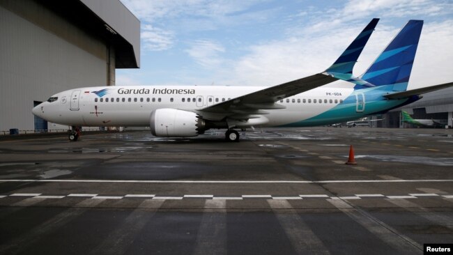 FILE - A Garuda Boeing 737 Max 8 airplane is parked at the Garuda Maintenance Facility AeroAsia, at Soekarno-Hatta International airport near Jakarta, Indonesia, March 13, 2019.