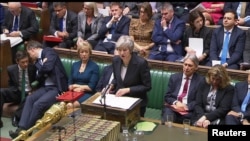 An image from video shows Britain's Prime Minister Theresa May speaking about Brexit in the House of Commons, in central London, Britain, Nov. 15, 2018.