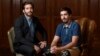 Jake Gyllenhaal, left, poses for portrait with Boston Marathon bombing survivor Jeff Bauman during the Toronto International Film Festival in Toronto.n