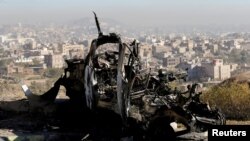 The wreckage of a vehicle is pictured at the site of airstrikes in Sana'a, Yemen, Dec. 26, 2017. 