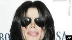 Sony to Release New Michael Jackson Single; Carey Celebrates Album Release, Movie