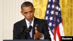 U.S. President Barack Obama is seen speaking at a news conference at the White House in Washington in this August 9, 2013, file photo.