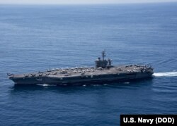 FILE - The aircraft carrier USS Carl Vinson (CVN 70) transits the Indian Ocean, April 15, 2017.