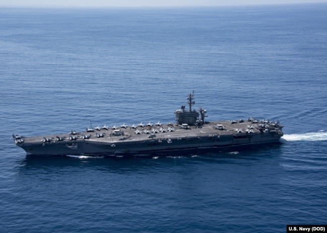 FILE - The aircraft carrier USS Carl Vinson (CVN 70) transits the Indian Ocean, April 15, 2017.