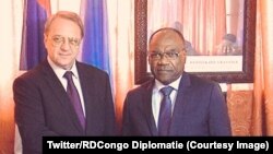 Le vice-Premier ministre congolais en charge des Affaires étrangères Léonard She Okitundu, à droite, reçoit le vice-ministre russe des Affaires Etrangères Mikhail Bogdanov à Kinshasa, le 6 juin 2018. (Twitter/RDCongo Diplomatie)