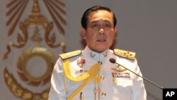 FILE - Gen. Prayuth Chan-ocha speaks at the start of his first press conference since Thursday's coup, May 26, 2014. 