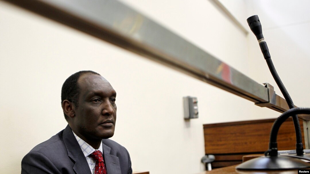 FILE - Exiled Rwandan General Faustin Kayumba Nyamwasa looks on during his court appearance in Johannesburg.