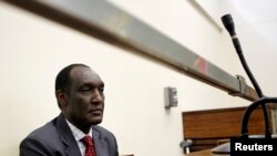 FILE - Exiled Rwandan General Faustin Kayumba Nyamwasa looks on during his court appearance in Johannesburg.