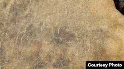 Engraved Cherokee syllabary inscription from 1.5km into Manitou Cave is signed, "Richard Guess," believed to be the son of Cherokee syllabary inventor Sequoyah, also known as George Guess or Gist.