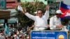 In this June 2, 2017, file photo, opposition party Cambodia National Rescue Party (CNRP) leader Kem Sokha greets his supporters at a rally in Phnom Penh.