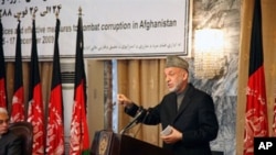 Handout photo of Afghan President Hamid Karzai speaking during an anti-corruption conference in Kabul on 15 Dec 2009